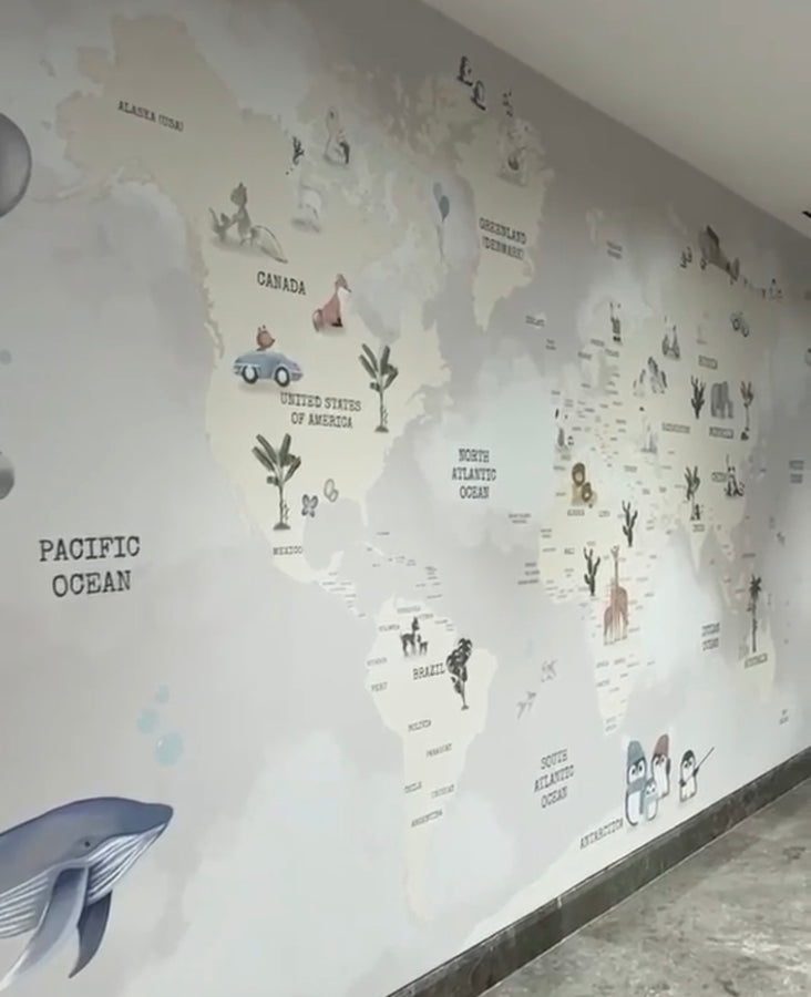 Hand-drawn world map mural in a corridor of the Acıbadem Altunizade Hospital children’s wing