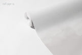 Clouds Wallpaper Mural in Paper (Greige); unrolled roll showing the soft greige cloud pattern | Craft Paper Co