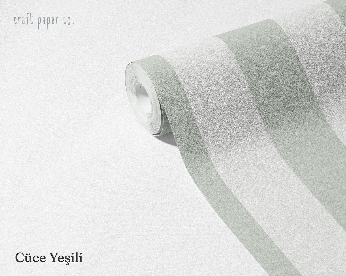 Striped Wallpaper Mural in Gnome Green; unrolled roll showing soft green stripes | Craft Paper Co
