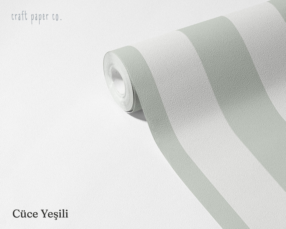 Striped Wallpaper Mural in Gnome Green; unrolled roll showing soft green stripes | Craft Paper Co