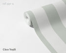 Striped Wallpaper Mural in Gnome Green; unrolled roll showing soft green stripes | Craft Paper Co
