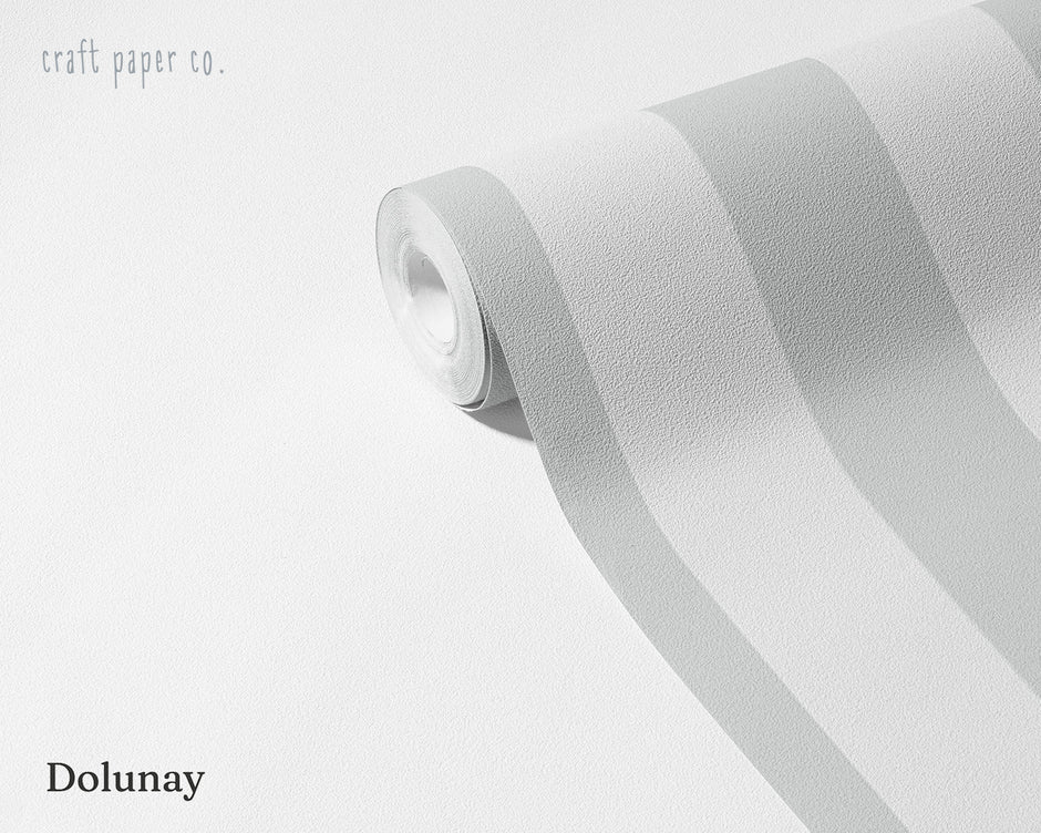 Çizgili Dolunay Duvar Kağıdı; açılmış rulo üzerinde açık gri geniş çizgiler | Craft Paper Co