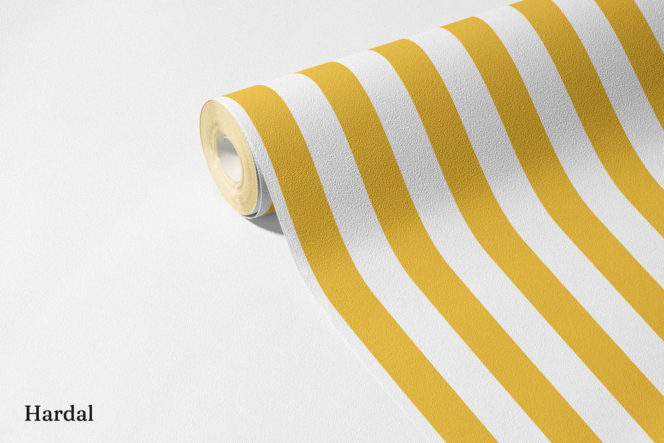 Çizgili Duvar Kağıdı Hardal; açılmış non-woven ruloda hardal sarısı dikey çizgiler | Craft Paper Co