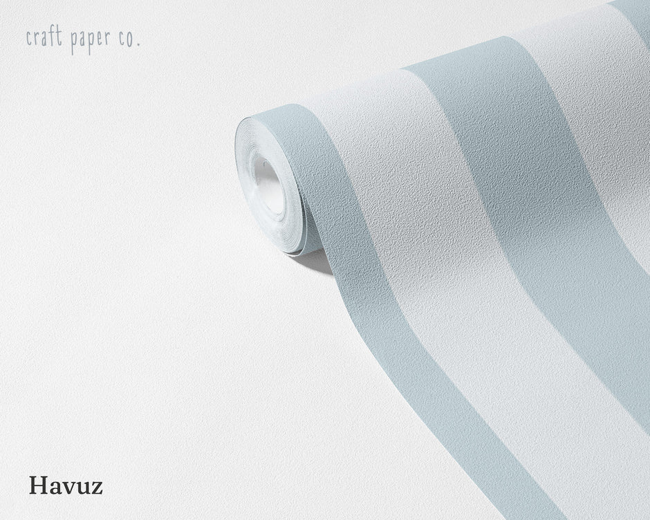 Striped Wallpaper Mural in Pool Blue; unrolled roll showing pool blue stripes | Craft Paper Co