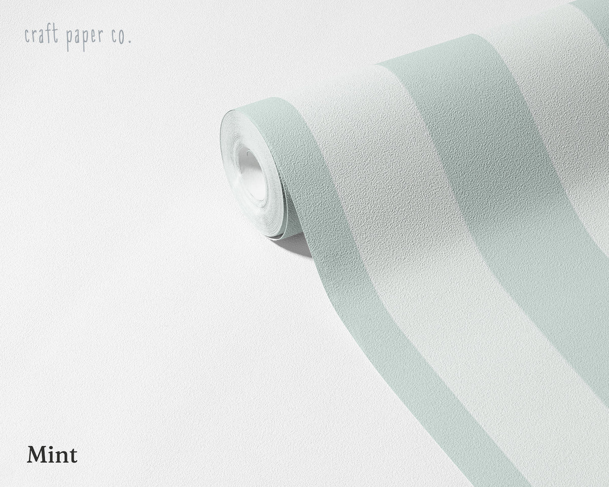 Striped Wallpaper Mural in Mint; unrolled roll showing mint green stripes | Craft Paper Co