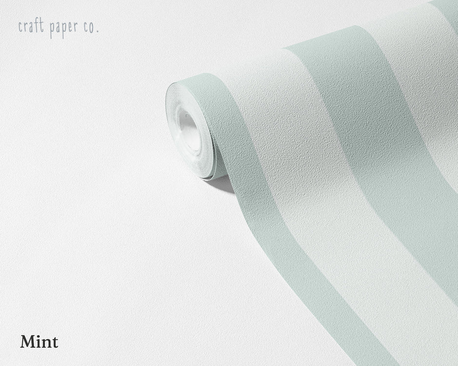 Striped Wallpaper Mural in Mint; unrolled roll showing mint green stripes | Craft Paper Co