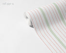 Thin Stripe Wallpaper Mural in Pink Sage; unrolled roll showing thin pink and sage stripes | Craft Paper Co