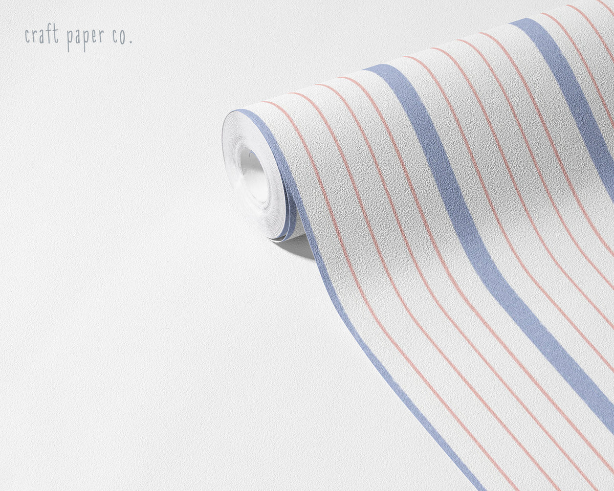 Thin Stripe Wallpaper Mural in Pink Lilac; unrolled roll showing thin pink and lilac stripes | Craft Paper Co