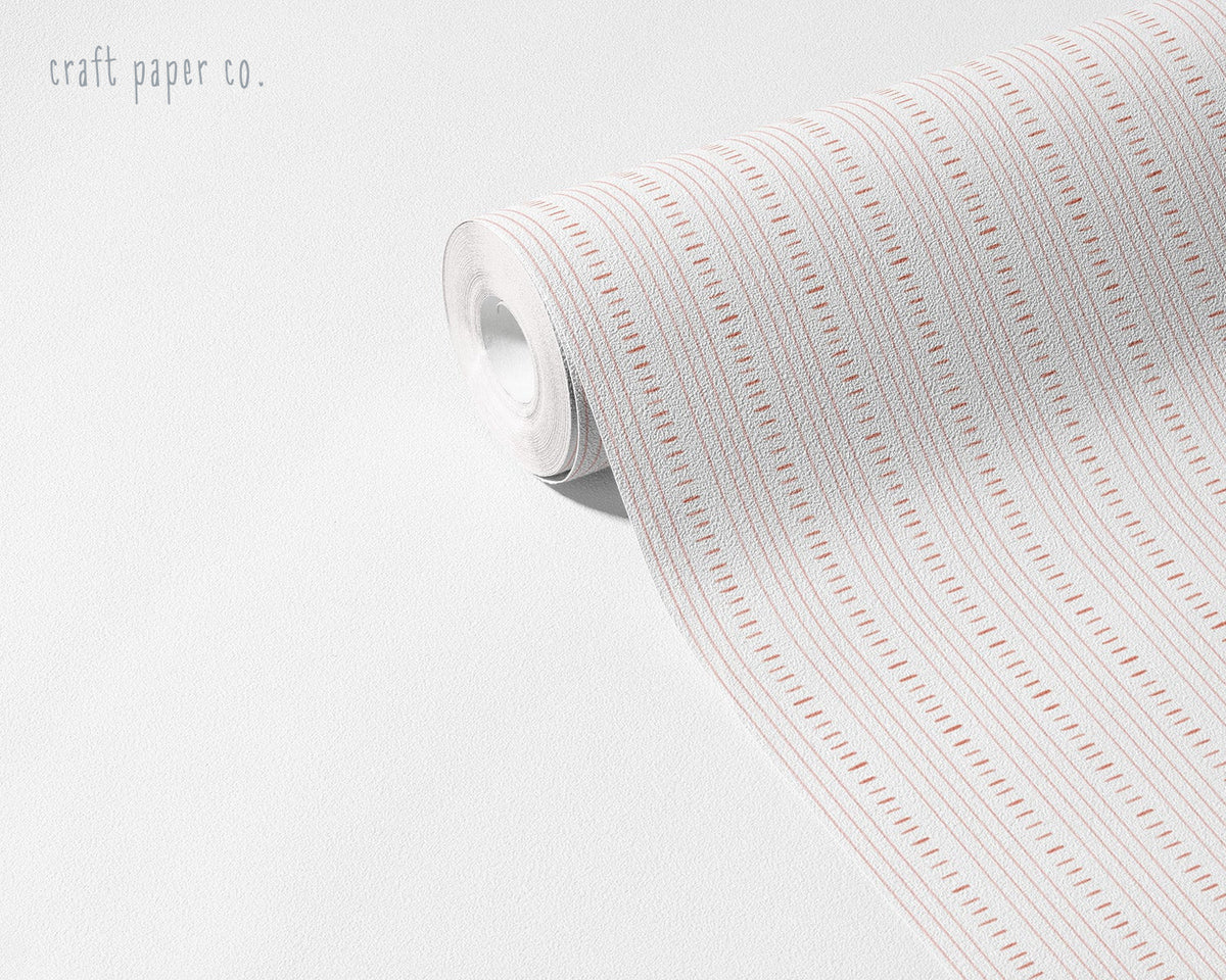 Linen Stitch Wallpaper Mural in Red; unrolled roll showing red stitch lines | Craft Paper Co