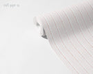 Linen Stitch Wallpaper Mural in Red; unrolled roll showing red stitch lines | Craft Paper Co