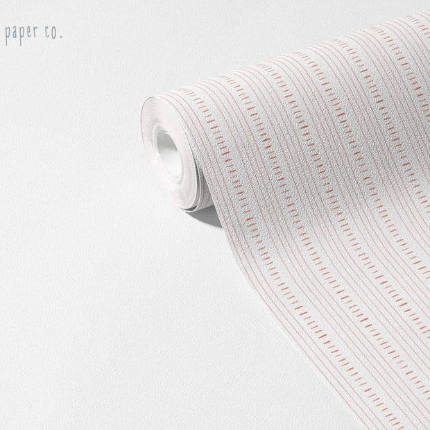 Keten Dikiş Kırmızı Duvar Kağıdı; açılmış rulo üzerinde ince kesik kırmızı dikiş çizgileri | Craft Paper Co