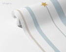 Blue & Beige Starry Stripe Wallpaper Mural; blue-beige stripes and a mustard-yellow star on an unrolled roll | Craft Paper Co