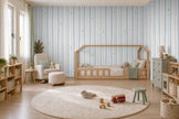 Blue & Beige Starry Stripe Wallpaper Mural; striped pattern wrapping onto the side wall in a kids' room with a wooden house bed | Craft Paper Co