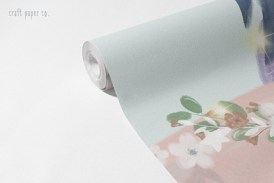 Blue-Haired Mermaid and Whales Wallpaper Mural; unrolled roll showing a pink whale with a flower crown | Craft Paper Co