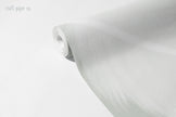 Angel Wing Feathers Wallpaper Mural in Gnome Green; roll close-up, soft texture of gray-green feathers | Craft Paper Co
