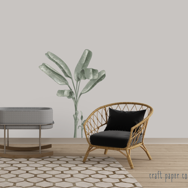 Muz Ağacı Yaprakları Çocuk Odası Duvar Sticker; rattan koltuk ve beşiğin olduğu odada duvarda muz ağacı yaprakları | Craft Paper Co