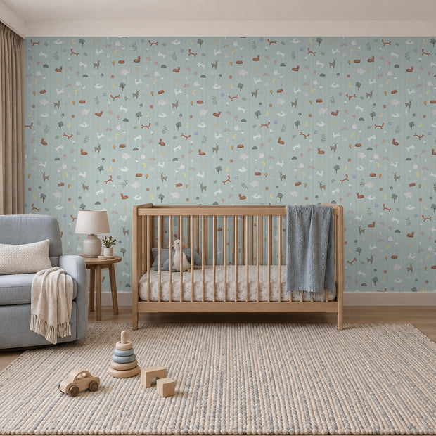 Nordik Desen bebek odası duvar kağıdı; ahşap beşik, mavi berjer ve oyuncak mutfakla mint orman deseni | Craft Paper Co
